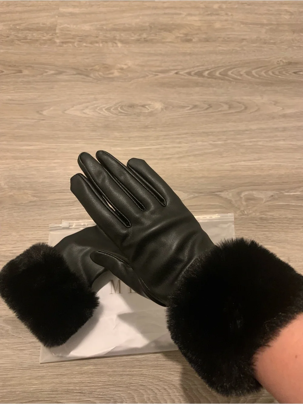 Black faux leather fur cuff gloves.
